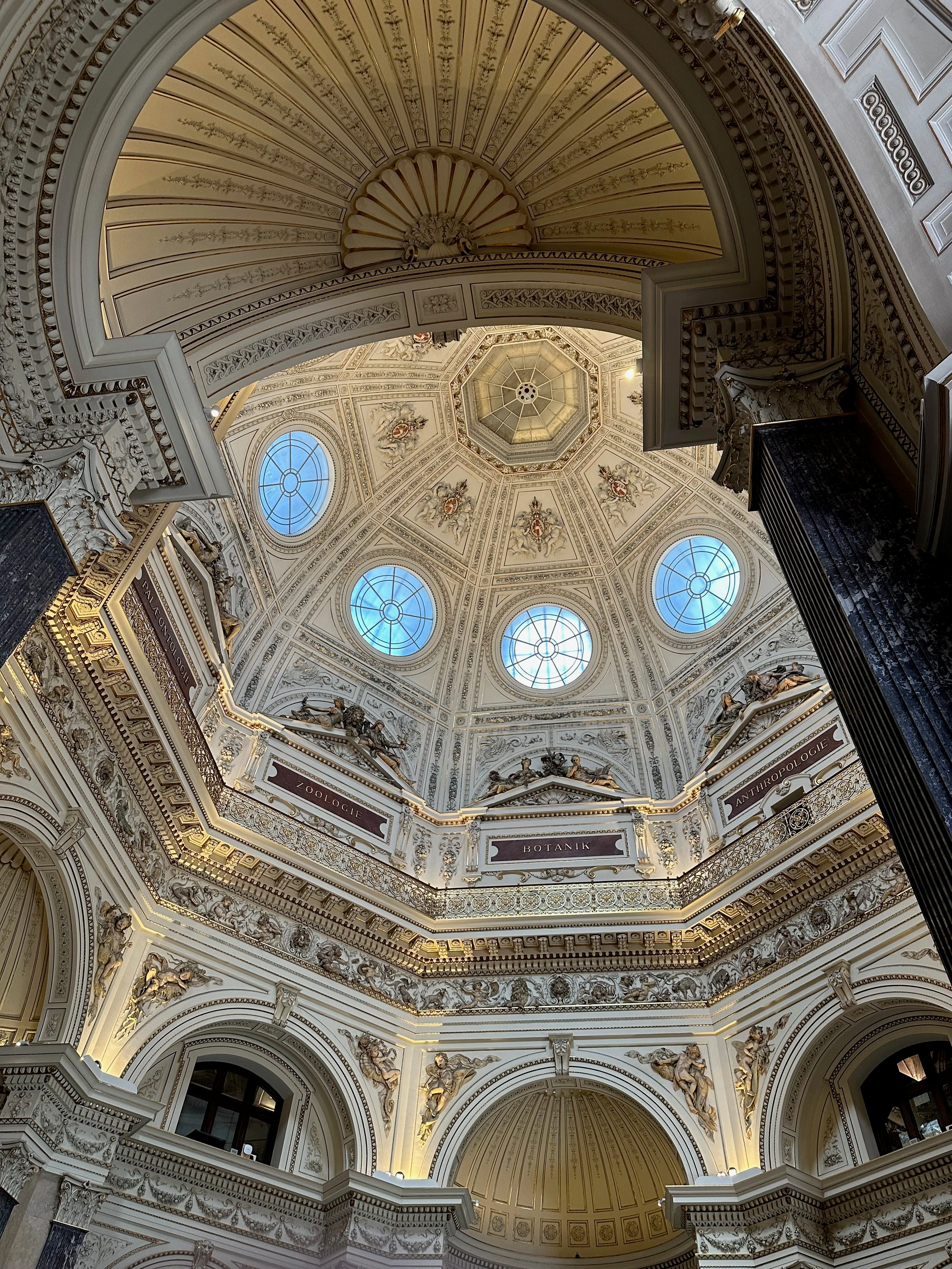 Looking up into the Naturhistorisches Museum's central dome, with circular skylights