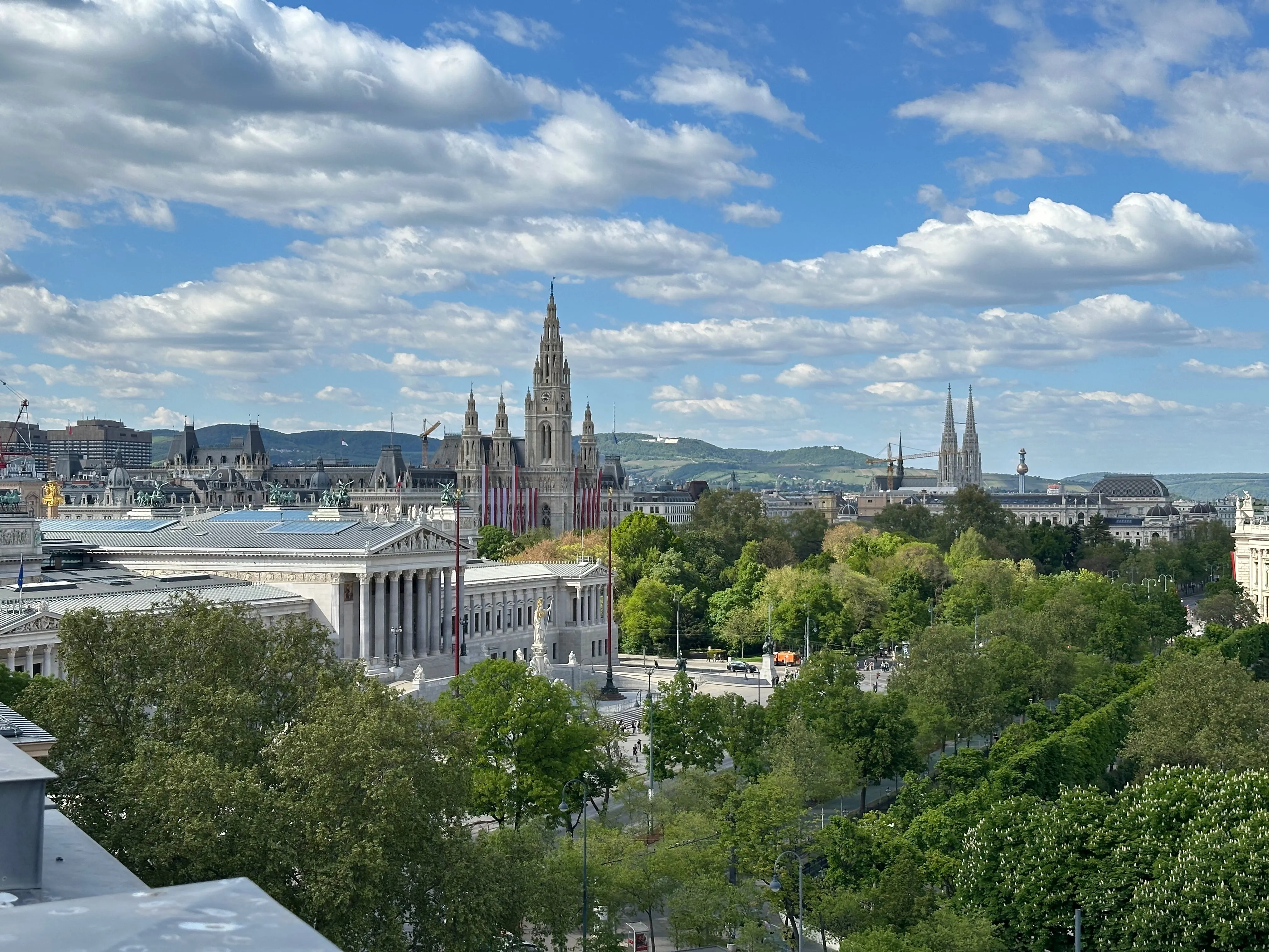 View of Vienna's Parliament, Rathaus, and Votivkirche from the Naturhistorisches rooftop