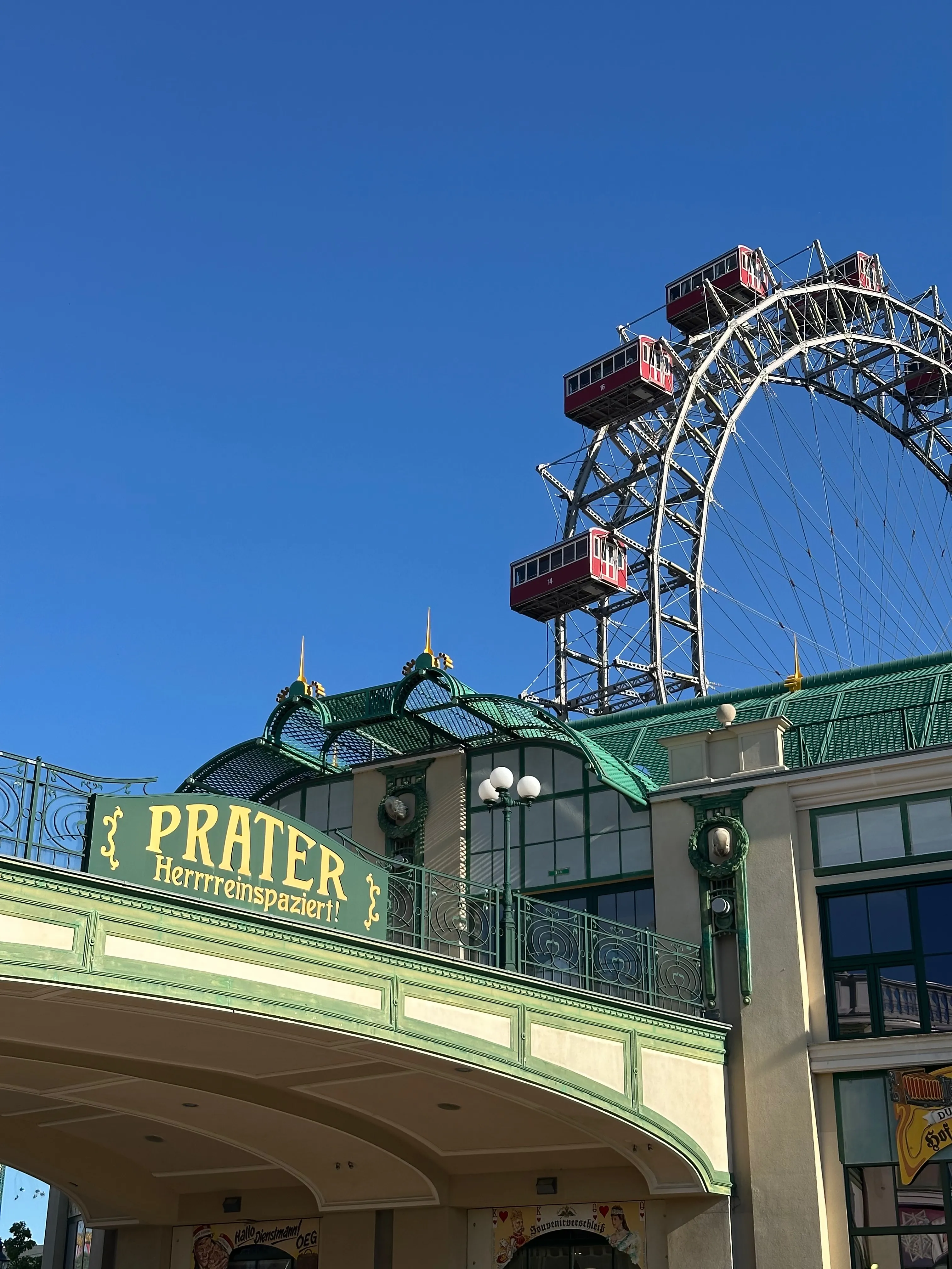 The Prater entrance with the Riesenrad—Vienna's iconic ferris wheel—rising above the gates