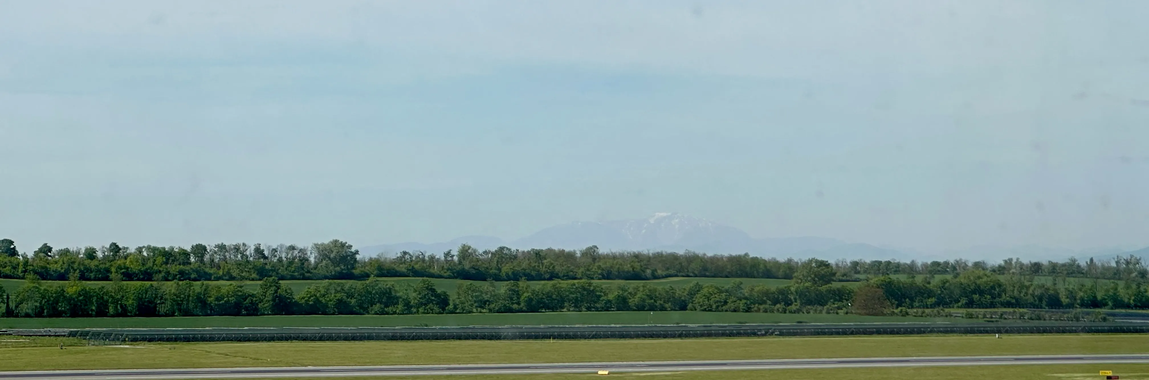 Looking out from Vienna International with the Austrian Alps faint in the distance