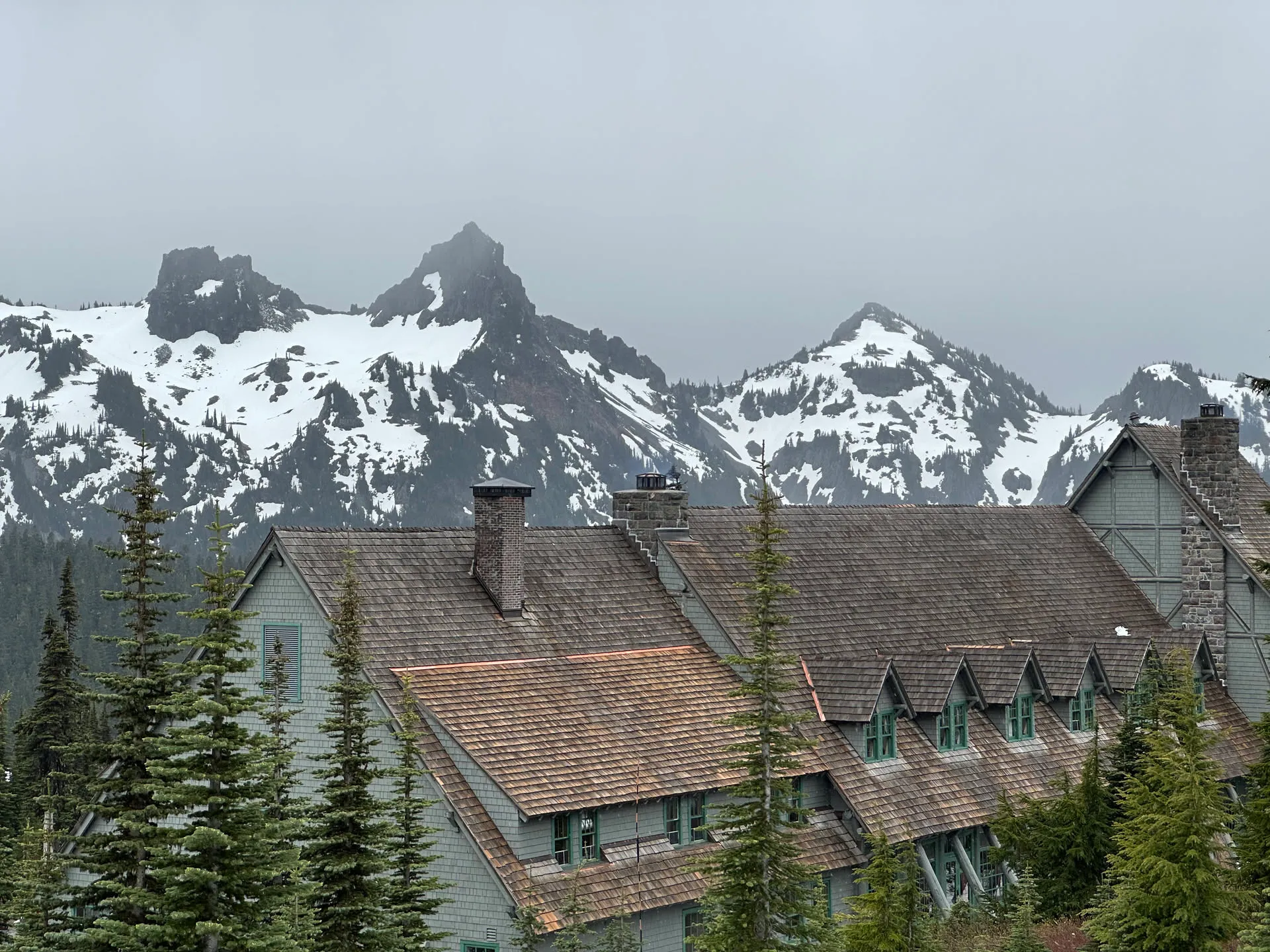 The historic Paradise Inn under the snowy Tatoosh Range
