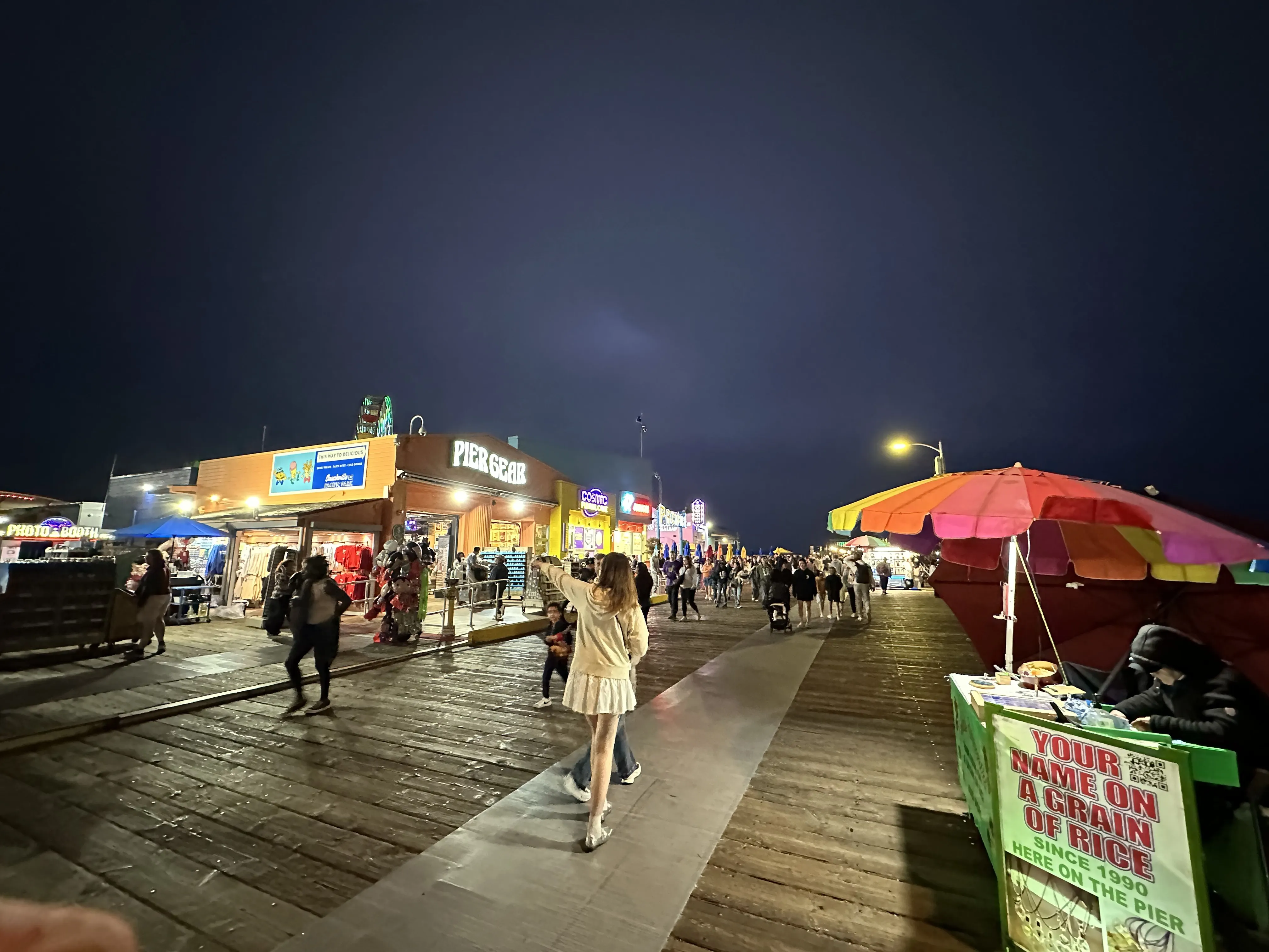 Boardwalk shops and lights along the Santa Monica Pier