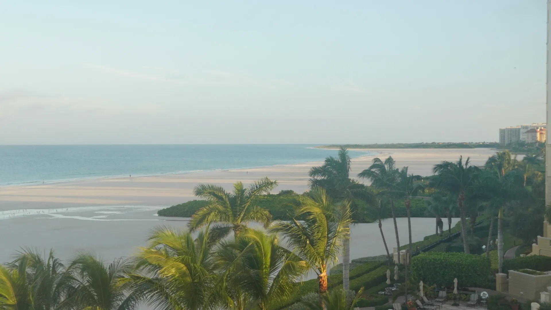 Beach at first light with calm water