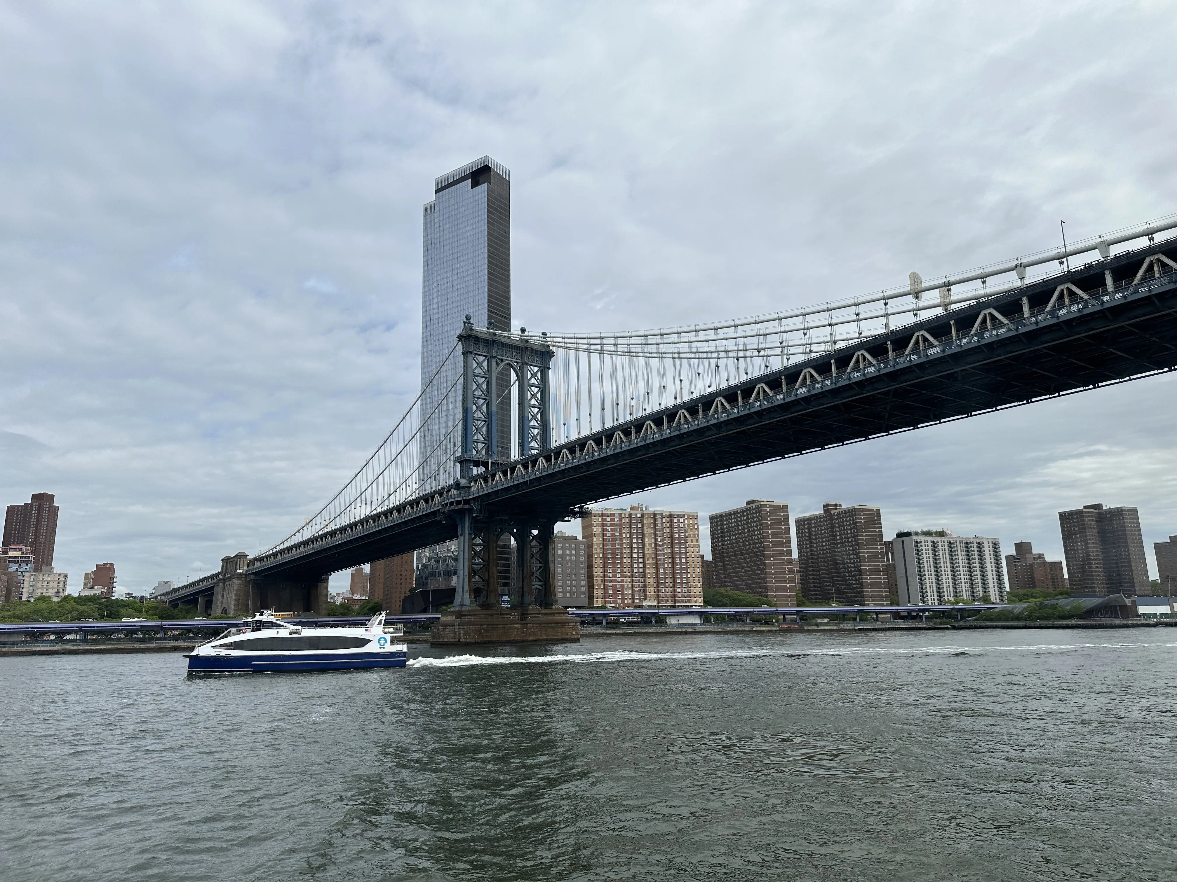 The Manhattan Bridge spanning the East River with the skyline beyond