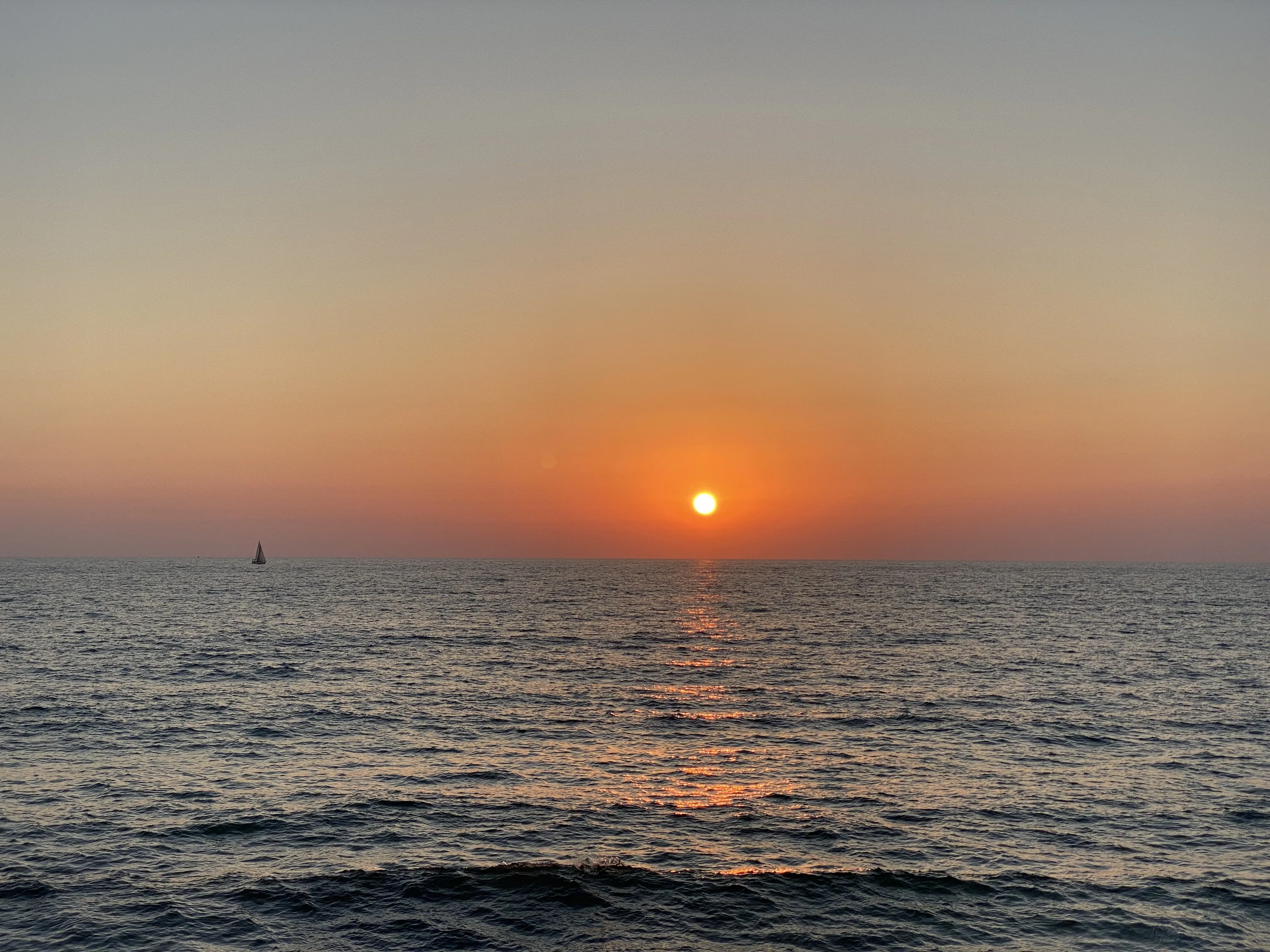 Big sun setting over the Mediterranean